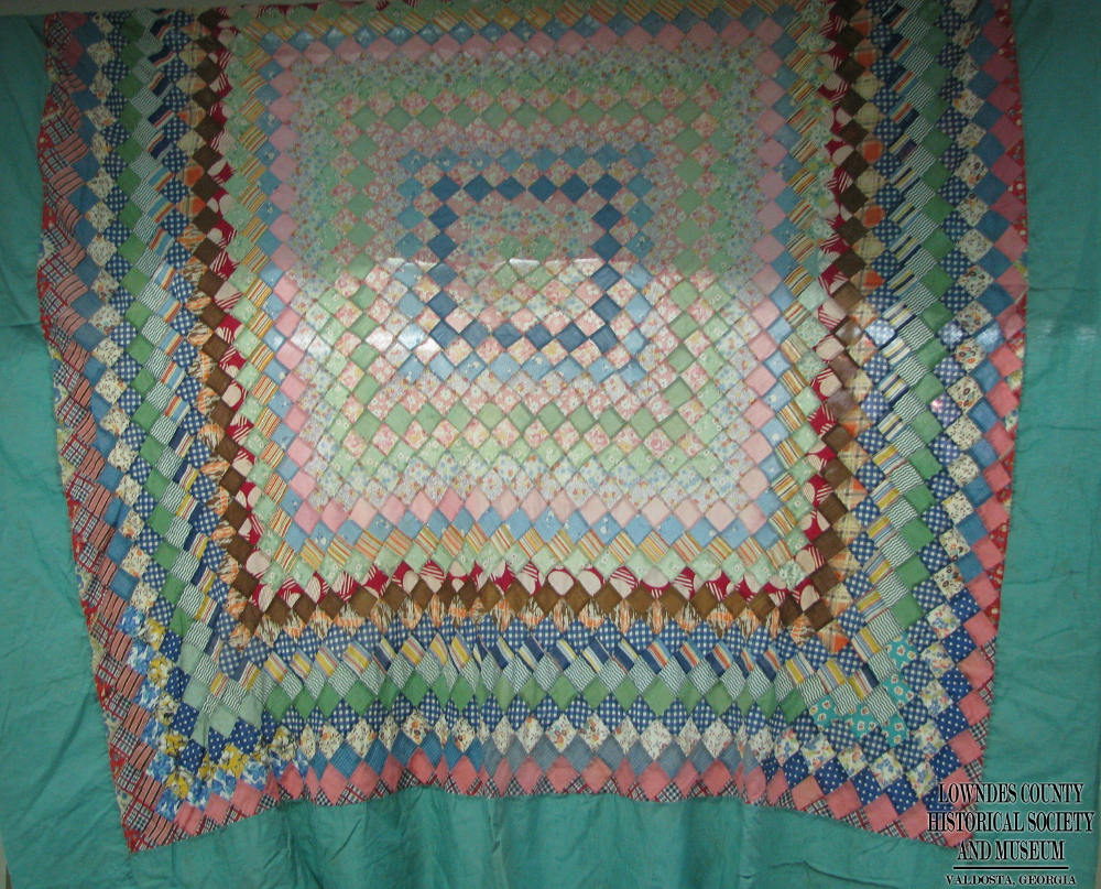 This quilt top was made by etheMrs. Hukman's grandmother Mrs. Tom (Leonna) Dennared or Mrs. Joe Dennard the cousin Mrs. Joe (Anna L.) Dennard.